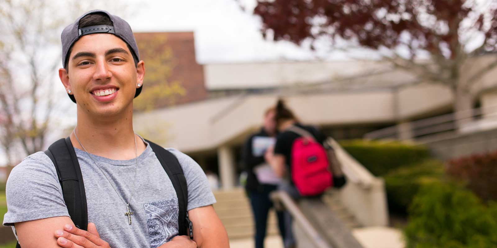 Student on campus at Holy Family University