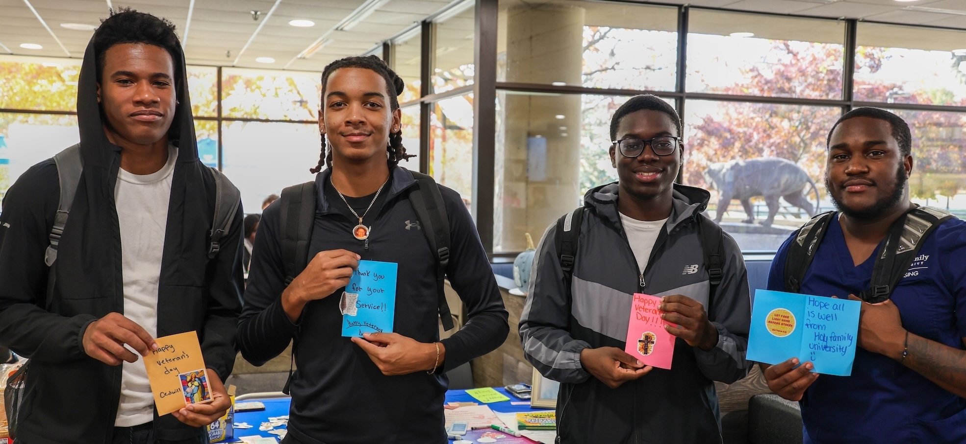 Four Holy Family University students at the campus ministry event