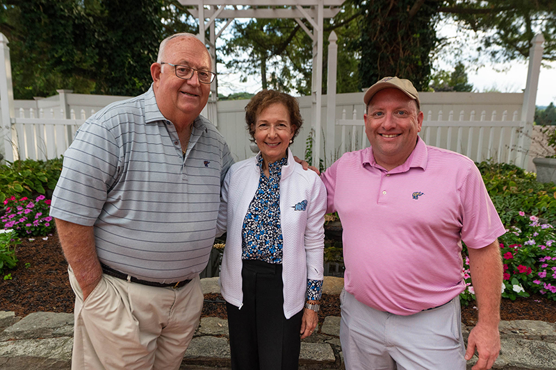 Dr. Anne Prisco with Holy Family trustees Joe Slabinski and Bill Mandia.