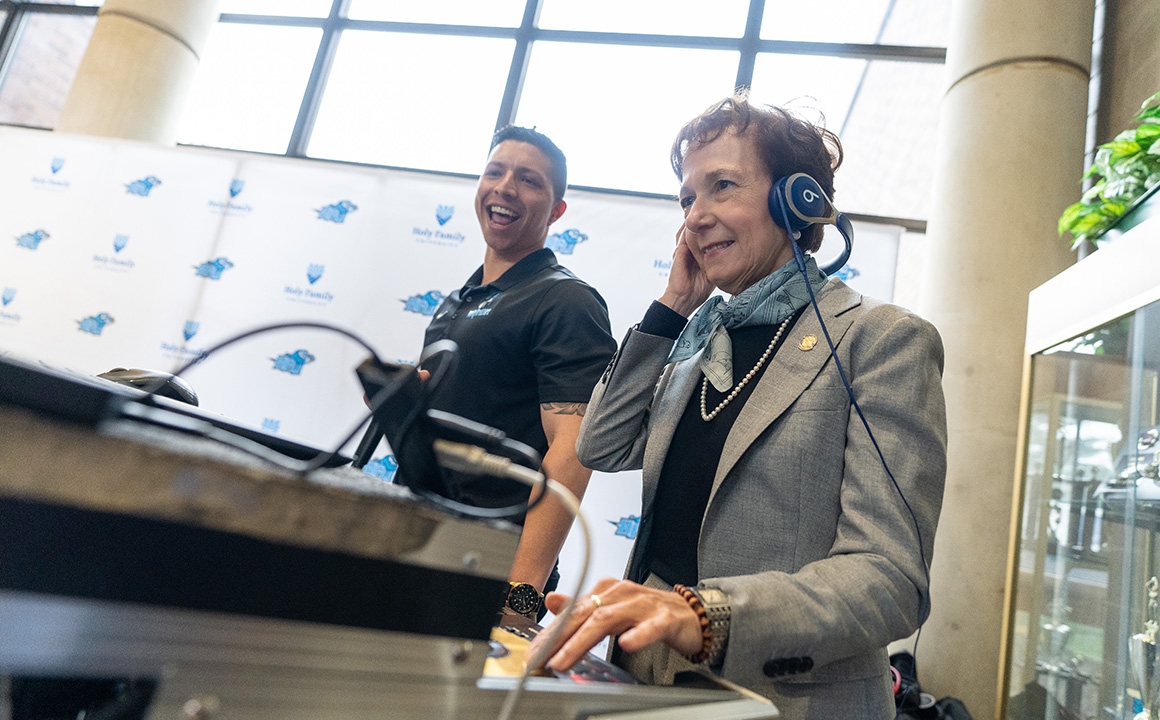 Dr. Prisco joins the fun and spins with the DJ at the Inauguration Week Student Block Party.