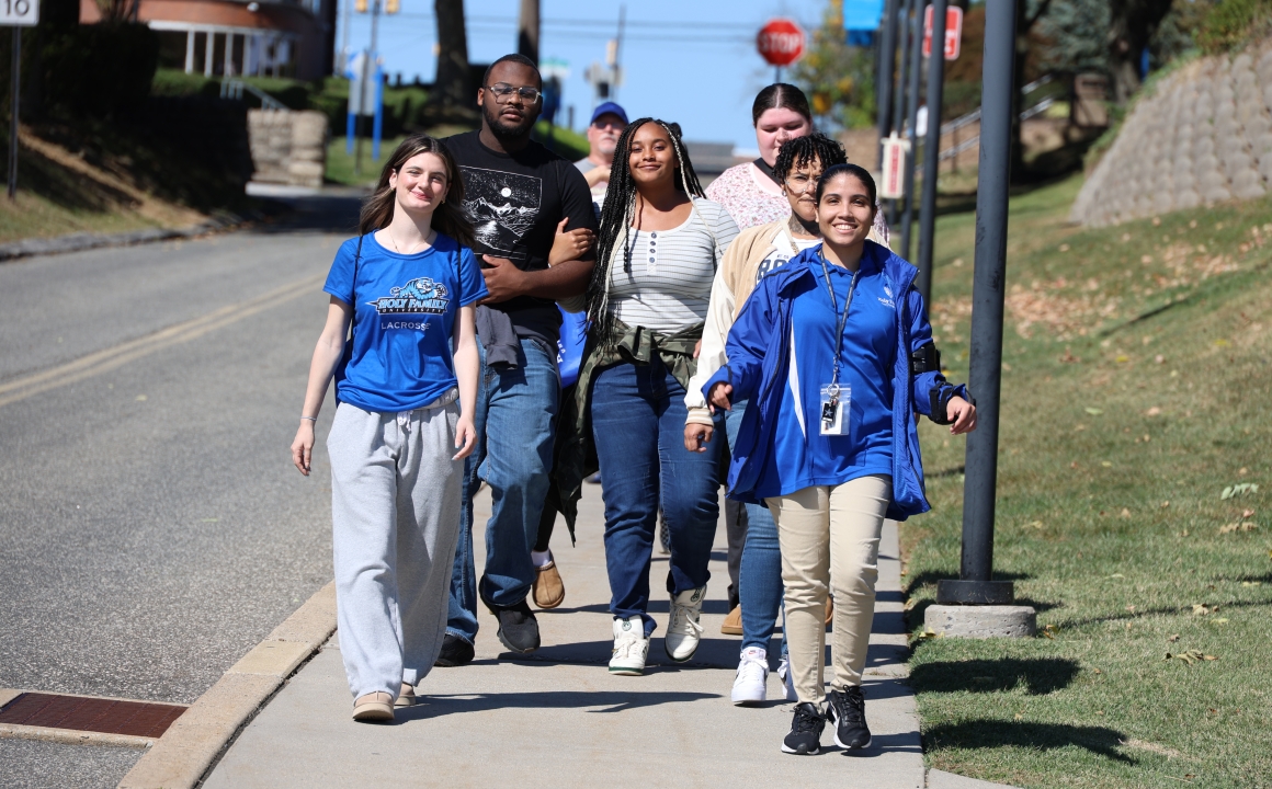 Holy Family students walking down Stevenson Lane.