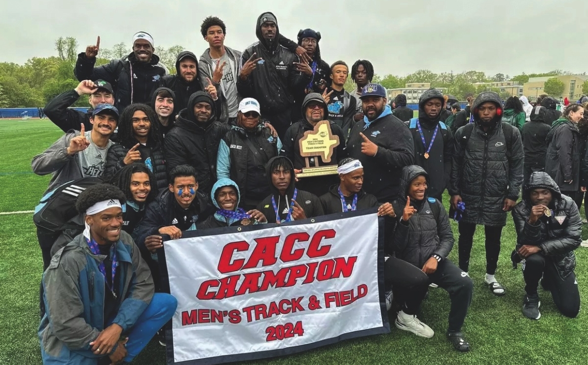 HFU men's track & field team with a CACC 2024 banner