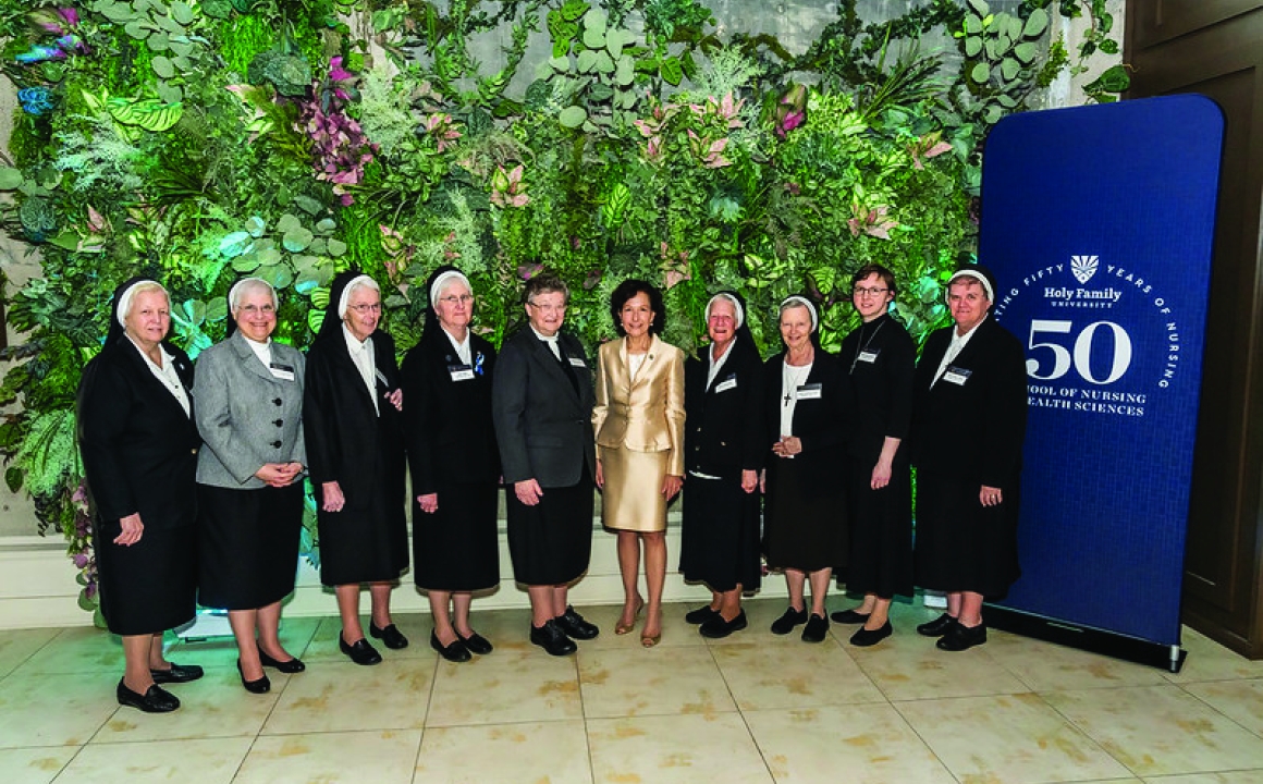 Dr. Prisco with members of the Sisters of the Holy Family of Nazareth