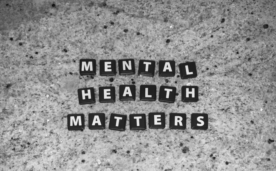 Letter tiles that spell out "Mental Health Matters"