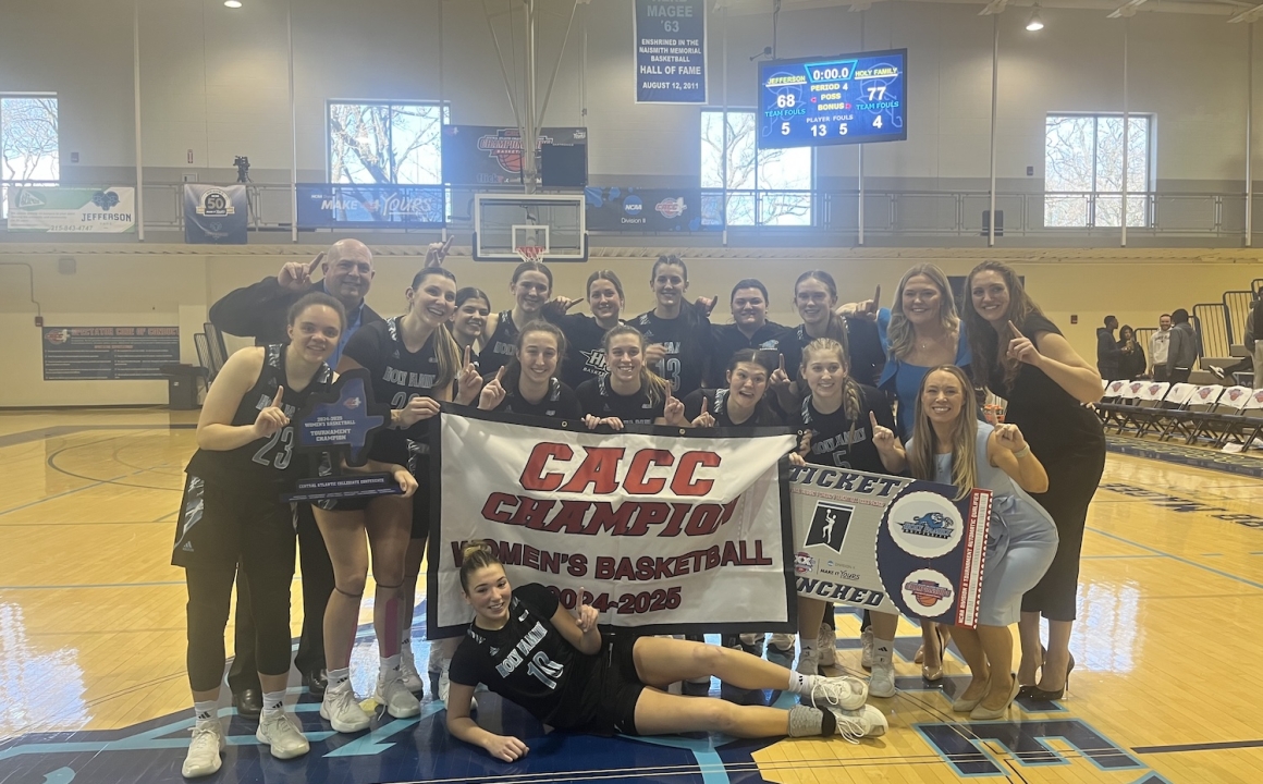 HFU Women's Basketball team celebrating the CACC Championship