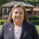 Sylvia McGeary standing in front of HFU's gazebo