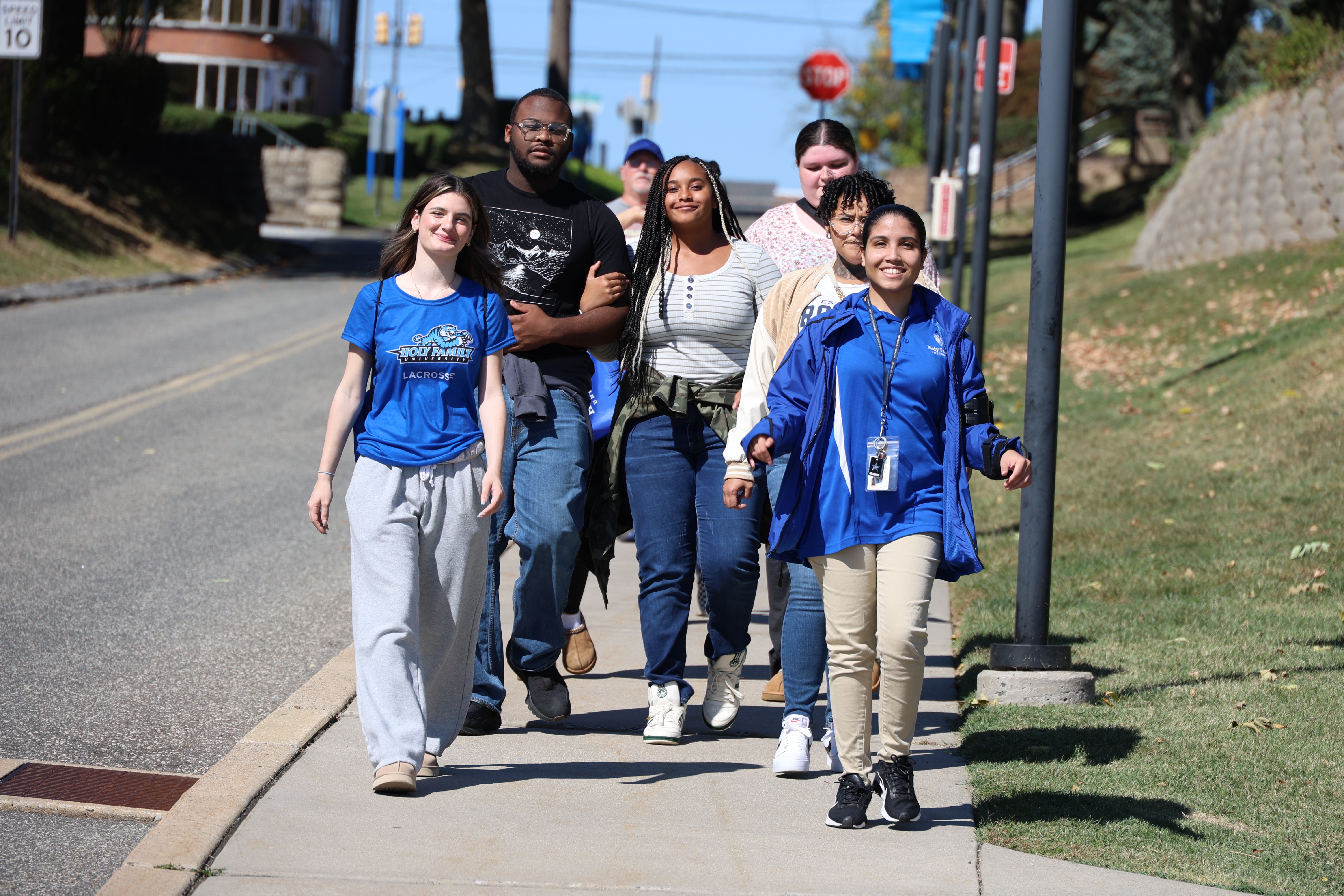 Holy Family students walking down Stevenson Lane.