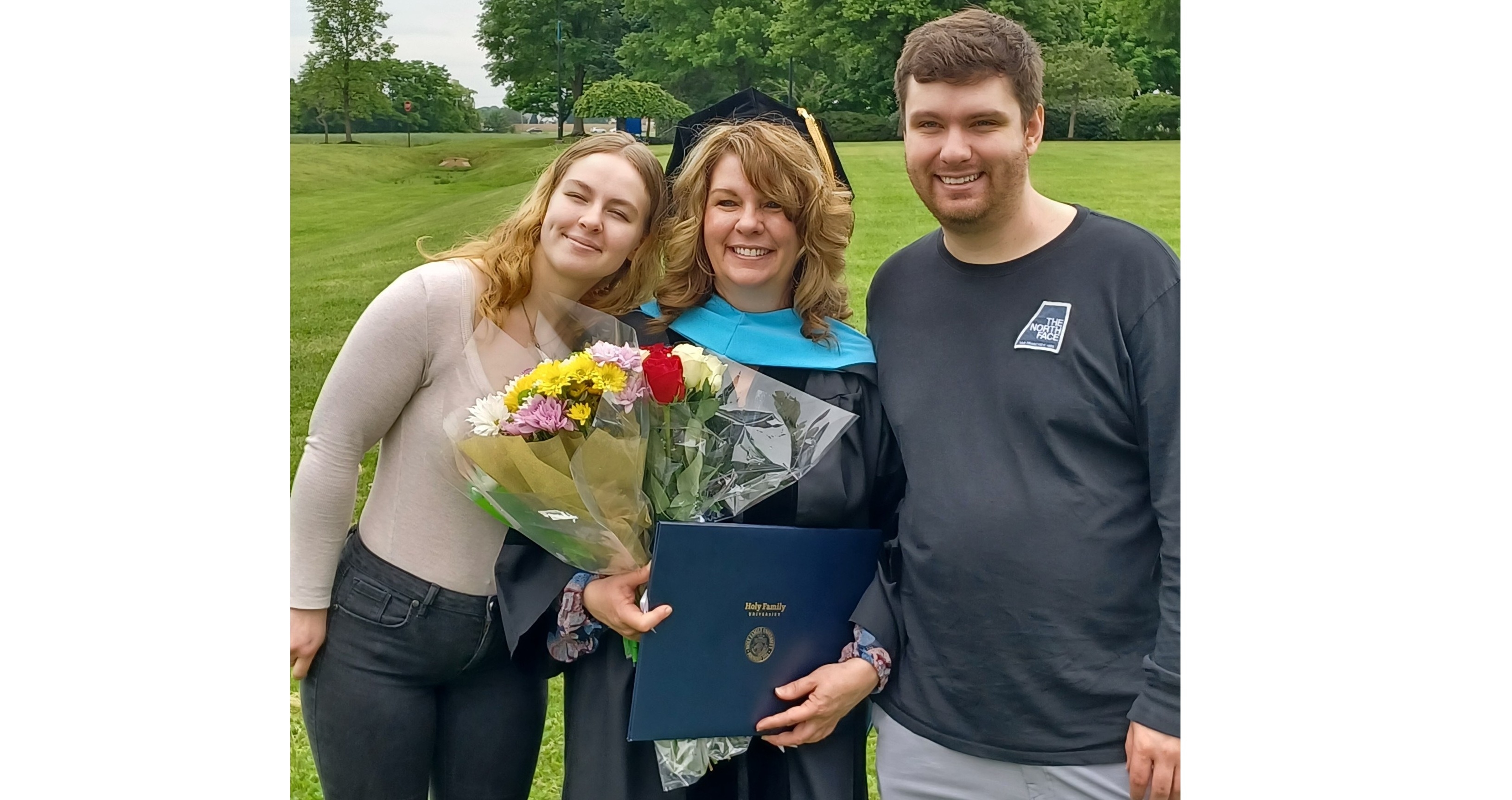 Angela Ashley Graduation Picture w/ Family