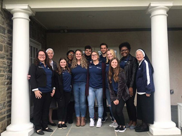 SGA group in front of Marian Hall