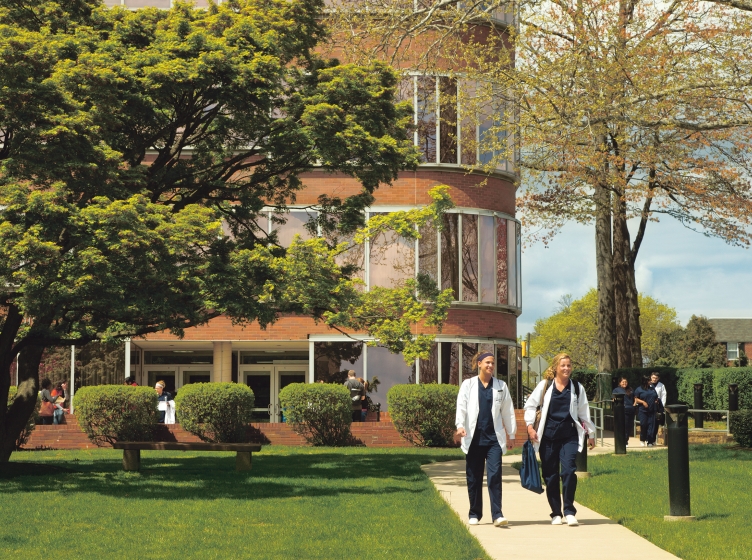 Nurses walking through campus