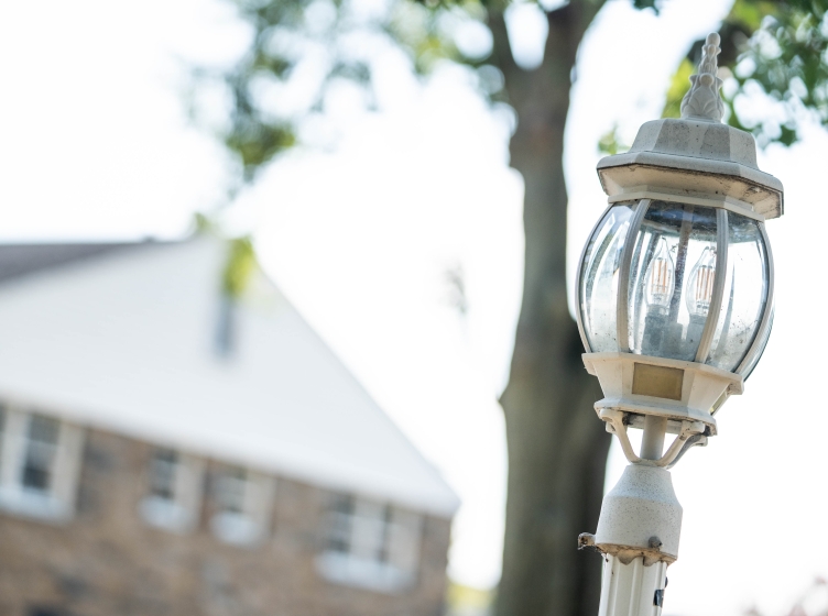 Lamp post and campus building