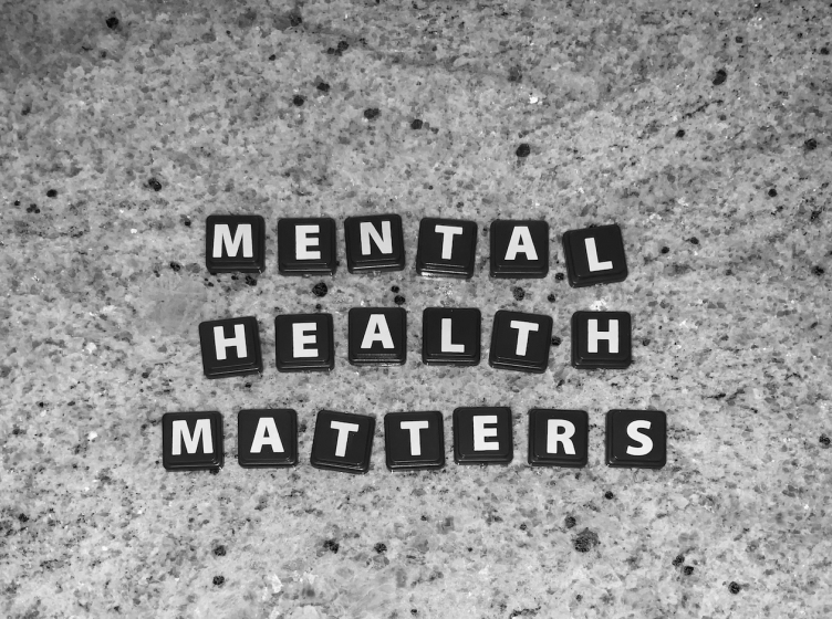 Letter tiles that spell out "Mental Health Matters"