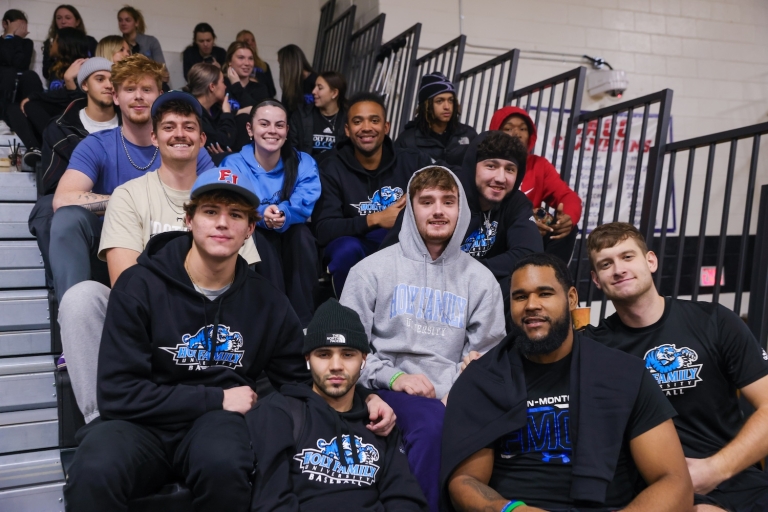 Students sitting in stands at the HFU Campus Center Gym