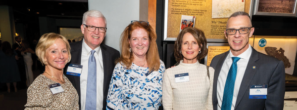 Karen Earley, Phil Earley, Gail (Garberina) Campbell ’82, Grace (Bennett) Wandling ‘86, and Jim Bennett, Esq., ’82 share their thoughts on exhibits at the museum.
