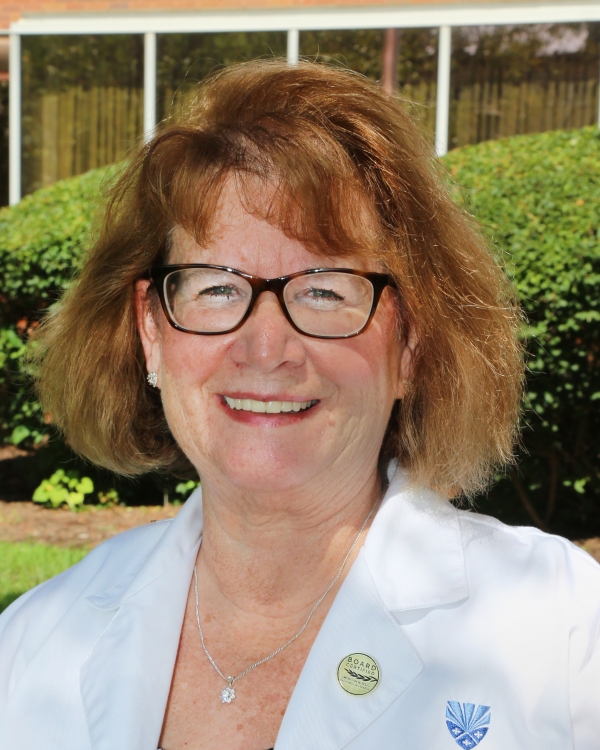 Headshot of Margaret Harkins.