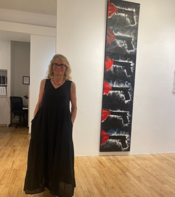 Pamela Flynn standing in a art gallery